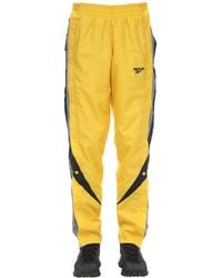 pantalones reebok amarillo