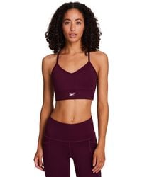 Reebok - Id Train Tri-back Mid-impact Sports Bra - Lyst