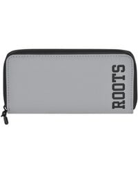 ROOTS - Slim Zipper Round Wallet - Lyst