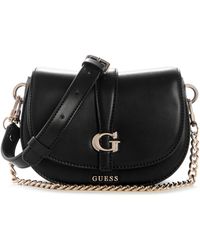 Guess - Carrie Mini Flap Magnetic Closure Crossbody Bag - Lyst