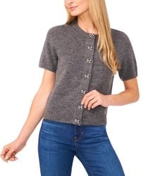 Cece - Short Sleeve Bow Button Cardigan Sweater - Lyst