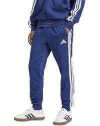 adidas - Essentials Regular-fit 3-stripes Fleece joggers - Lyst