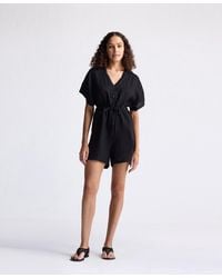 REISTOR - V Neck Drawstring Romper - Lyst
