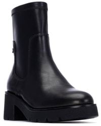 Xti - Stretchy Chelsea Booties - Lyst