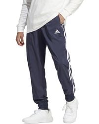 adidas - Essentials 3-stripes Cargo Pocket joggers - Lyst