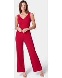 Bebe - Scuba Crepe V-neck Jumpsuit - Lyst