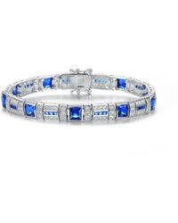 Genevive Jewelry - Rhodium Plated Emerald Cubic Zirconia Tennis Bracelet - Lyst