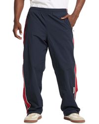 Guess - Cargo Windbreaker Pants - Lyst