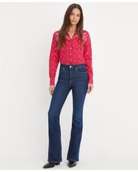 GOOD AMERICAN - Dolly Joleans Flare Jeans - Lyst