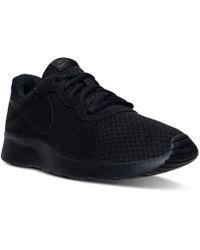 nike black tanjun sneakers