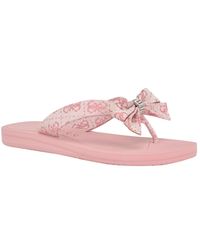 Guess - Tuta Low Embellished Bow Molded Flip Flops - Lyst