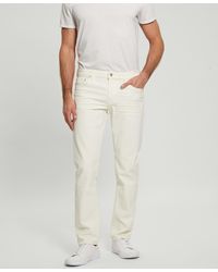 Guess - Denim Coated Tapered Jeans - Lyst