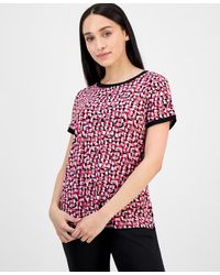 Anne Klein - Petite Printed Button-back Short-sleeve Blouse - Lyst