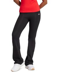 adidas - Essentials Small Logo Flared leggings - Lyst