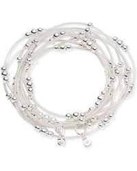 Nine West - Tone White Cord Multi-row Beaded Stretch Bracelet - Lyst