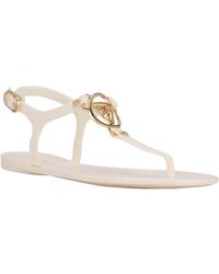 Guess Rainey Logo Square Toe T-strap Flat Sandals in Metallic | Lyst