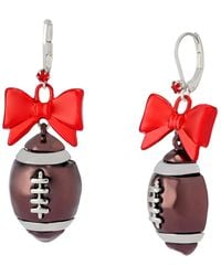 Betsey Johnson - Faux Stone Kick Off Bow Football Drop Earrings - Lyst