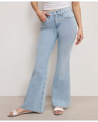 GOOD AMERICAN - Petite Good Soft-tech Mid-rise Flare-leg Jeans - Lyst