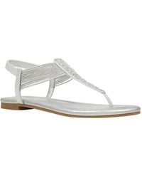 Bandolino - Kayte Embellished T Strap Flat Sandals - Lyst