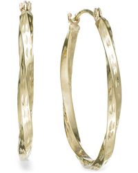 Macy's - Textured Twisted Hoop Earrings In 10k Gold - Lyst