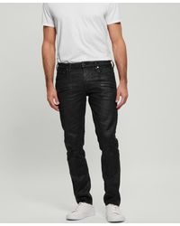 Guess - Coated Denim Slim Tapered Zip Jeans - Lyst