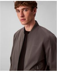 Calvin Klein - Logo-print Matte Bomber Jacket - Lyst