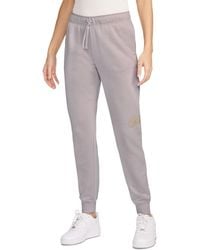 Nike - Mid-rise Club Fleece Shine joggers - Lyst