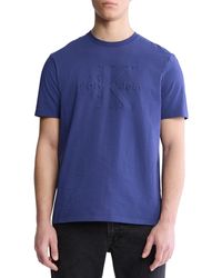 Calvin Klein - Regular-fit Embossed Monogram Logo Graphic T-shirt - Lyst