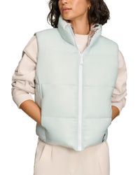 Starter - Reversible Zip-front Puffer Vest - Lyst