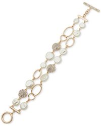 Anne Klein - Gold-tone White Imitation Pearl & Two-row toggle Flex Bracelet - Lyst
