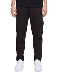 PUMA - Ess Regular-fit Logo Embossed Fleece Cargo Pants - Lyst