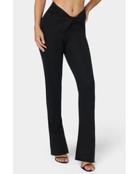 Bebe - Twisted Waist Flared Leg Pant - Lyst
