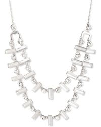 Versace Puka Shell Necklace in Metallic - Lyst