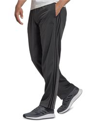 primegreen essentials warm up slim tapered 3 stripes track pants