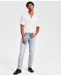 Guess - Finnley Slim Fit Tapered Leg Stretch Jeans - Lyst