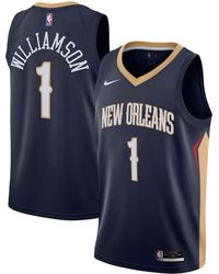 Nike Men's Dallas Mavericks 2021 Earned Edition Kristaps Porzingis Dri-Fit Swingman Jersey, Small