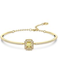 Swarovski - Gold-tone Millenia Crystal Bangle Bracelet - Lyst