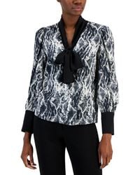 Anne Klein - Contrast-trimmed Printed Satin Bow Blouse - Lyst