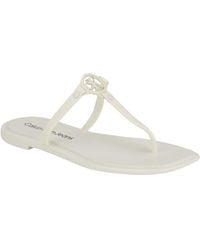 Calvin Klein - Edhen Logo T-strap Flat Jelly Sandals - Lyst