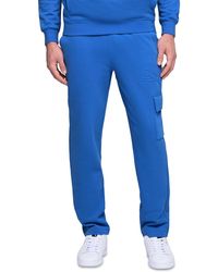 PUMA - Ess Regular-fit Logo Embossed Fleece Cargo Pants - Lyst