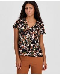 Anne Klein Essentials - Petite Printed Ruffle-trim Short-sleeve Top - Lyst