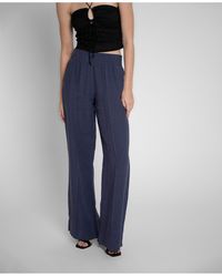 Nicole Miller Wide-leg and palazzo pants for Women | Lyst