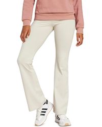 adidas - Essentials Small Logo Flared leggings - Lyst