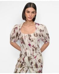 DKNY - Printed Woven Zip Puff-sleeve Top - Lyst
