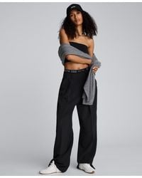 Kenneth Cole - High-rise Pleat Detail Pants - Lyst