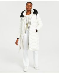 Vince Camuto - Belted Quilted Hooded Puffer Coat - Lyst