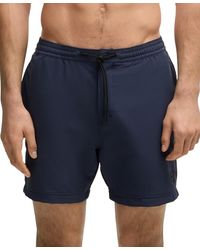 BOSS - Boss By Logo Badge Swim Shorts - Lyst