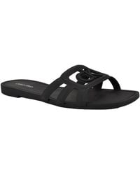 Calvin Klein - Yoana Logo Slip-on Jelly Flat Sandals - Lyst