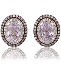 SUZY LEVIAN NEW YORK - Suzy Levian Sterling Silver Oval Cut Topaz And Sapphire Double Halo Stud Earrings - Lyst