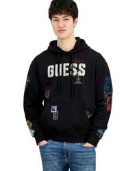 Guess - World Stamp Printed Pullover Logo Hoodie - Lyst